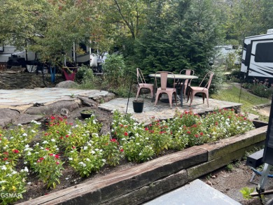 Absolutely beautiful creek front lot with large concrete deck on Bent Creek Golf Course in Tennessee - for sale on GolfHomes.com, golf home, golf lot