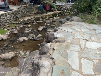 Absolutely beautiful creek front lot with large concrete deck on Bent Creek Golf Course in Tennessee - for sale on GolfHomes.com, golf home, golf lot