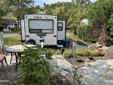 Absolutely beautiful creek front lot with large concrete deck on Bent Creek Golf Course in Tennessee - for sale on GolfHomes.com, golf home, golf lot