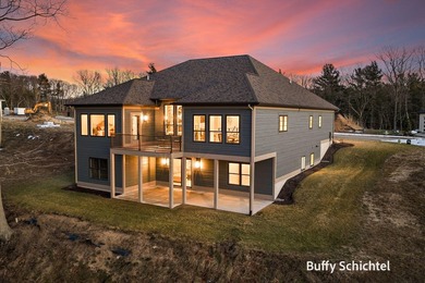 Experience refined living in this stunning golf course property on Muskegon Country Club in Michigan - for sale on GolfHomes.com, golf home, golf lot