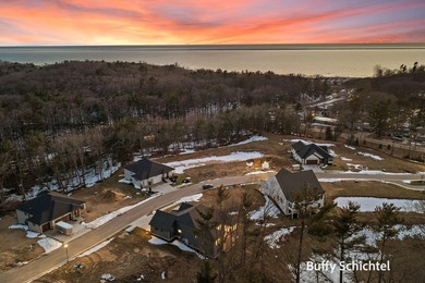 Experience refined living in this stunning golf course property on Muskegon Country Club in Michigan - for sale on GolfHomes.com, golf home, golf lot