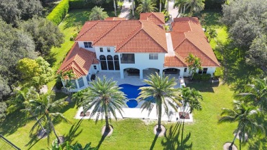 Experience unparalleled luxury in this 6,823-sq-ft under air on The Wanderers Club in Florida - for sale on GolfHomes.com, golf home, golf lot