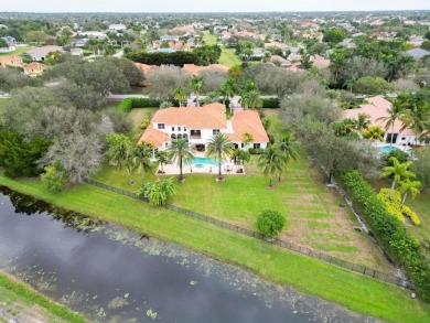 Experience unparalleled luxury in this 6,823-sq-ft under air on The Wanderers Club in Florida - for sale on GolfHomes.com, golf home, golf lot