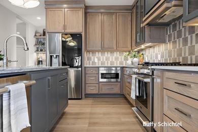 Experience refined living in this stunning golf course property on Muskegon Country Club in Michigan - for sale on GolfHomes.com, golf home, golf lot