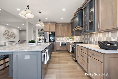 Experience refined living in this stunning golf course property on Muskegon Country Club in Michigan - for sale on GolfHomes.com, golf home, golf lot