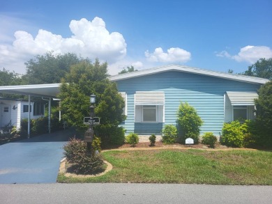 2/2 home has open floor plan. Large eat-in kitchen has lots of on Lake Henry Golf Club in Florida - for sale on GolfHomes.com, golf home, golf lot