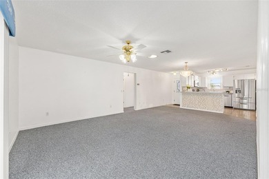 One or more photo(s) has been virtually staged. Tucked away in on Glenview Championship Golf and Country Club in Florida - for sale on GolfHomes.com, golf home, golf lot