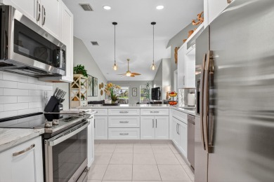 Welcome to this totally updated 2/2 Villa with beautiful & on Atlantic National Golf and Country Club in Florida - for sale on GolfHomes.com, golf home, golf lot