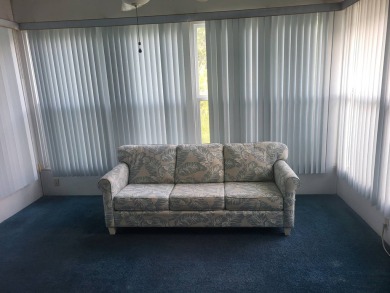 2/2 home has open floor plan. Large eat-in kitchen has lots of on Lake Henry Golf Club in Florida - for sale on GolfHomes.com, golf home, golf lot
