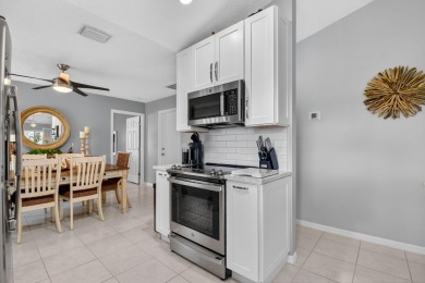 Welcome to this totally updated 2/2 Villa with beautiful & on Atlantic National Golf and Country Club in Florida - for sale on GolfHomes.com, golf home, golf lot