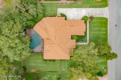 Welcome to your dream pool home in prestigious Hidden Hills on Hidden Hills Country Club in Florida - for sale on GolfHomes.com, golf home, golf lot