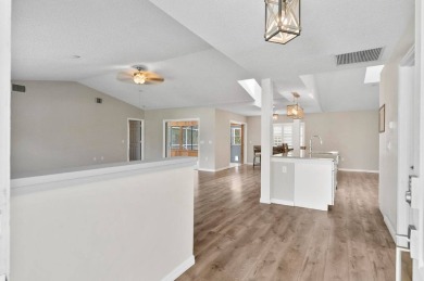 Welcome to your Florida dream home! This stunning 4-bedroom on The Grand Club - Pine Lakes Course in Florida - for sale on GolfHomes.com, golf home, golf lot