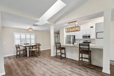 Welcome to your Florida dream home! This stunning 4-bedroom on The Grand Club - Pine Lakes Course in Florida - for sale on GolfHomes.com, golf home, golf lot