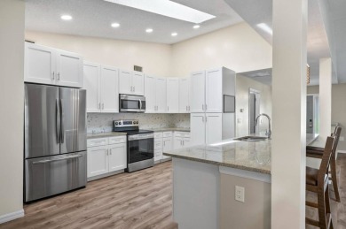 Welcome to your Florida dream home! This stunning 4-bedroom on The Grand Club - Pine Lakes Course in Florida - for sale on GolfHomes.com, golf home, golf lot