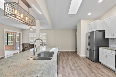 Welcome to your Florida dream home! This stunning 4-bedroom on The Grand Club - Pine Lakes Course in Florida - for sale on GolfHomes.com, golf home, golf lot