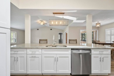 Welcome to your Florida dream home! This stunning 4-bedroom on The Grand Club - Pine Lakes Course in Florida - for sale on GolfHomes.com, golf home, golf lot