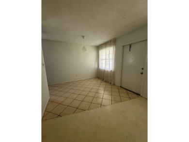 NO AGE RESTRICTION IN THIS BUILDING, WASHER AND DRYER INSIDE on The American Golf Club in Florida - for sale on GolfHomes.com, golf home, golf lot