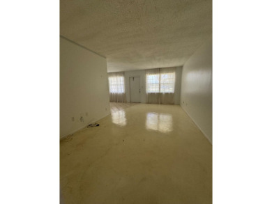 NO AGE RESTRICTION IN THIS BUILDING, WASHER AND DRYER INSIDE on The American Golf Club in Florida - for sale on GolfHomes.com, golf home, golf lot
