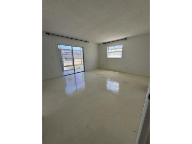 NO AGE RESTRICTION IN THIS BUILDING, WASHER AND DRYER INSIDE on The American Golf Club in Florida - for sale on GolfHomes.com, golf home, golf lot