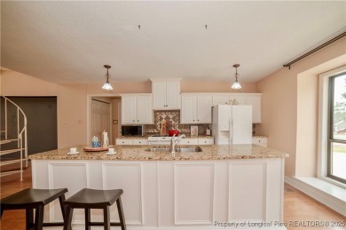 Freshly reduced to $359,900 -- the best single-family value in on Gates Four Golf and Country Club in North Carolina - for sale on GolfHomes.com, golf home, golf lot