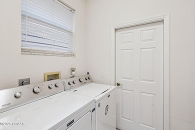 Welcome to 390 Foxhill, located in one of the gated sections of on Glen Abbey Golf Club in Florida - for sale on GolfHomes.com, golf home, golf lot