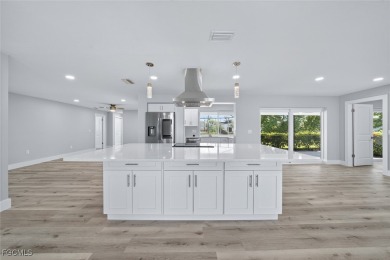 Beautifully Renovated Waterfront Oasis Now Available in on Whiskey Creek Country Club in Florida - for sale on GolfHomes.com, golf home, golf lot
