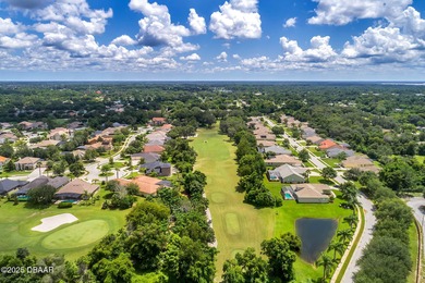 Welcome to 390 Foxhill, located in one of the gated sections of on Glen Abbey Golf Club in Florida - for sale on GolfHomes.com, golf home, golf lot