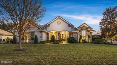 Step into elegance with this meticulously maintained residence on Plantation Bay Golf and Country Club in Florida - for sale on GolfHomes.com, golf home, golf lot