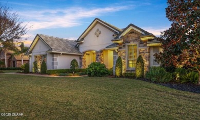 Step into elegance with this meticulously maintained residence on Plantation Bay Golf and Country Club in Florida - for sale on GolfHomes.com, golf home, golf lot