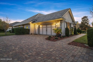 Step into elegance with this meticulously maintained residence on Plantation Bay Golf and Country Club in Florida - for sale on GolfHomes.com, golf home, golf lot