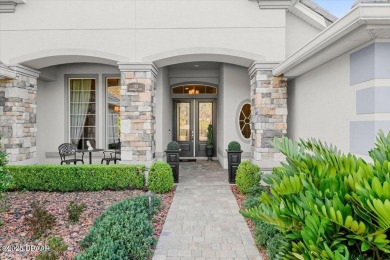 Step into elegance with this meticulously maintained residence on Plantation Bay Golf and Country Club in Florida - for sale on GolfHomes.com, golf home, golf lot