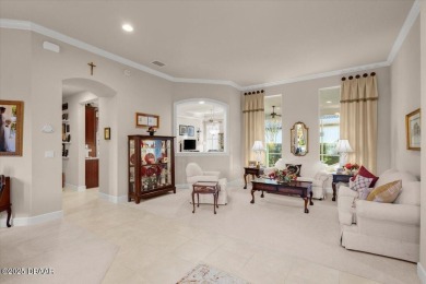 Step into elegance with this meticulously maintained residence on Plantation Bay Golf and Country Club in Florida - for sale on GolfHomes.com, golf home, golf lot