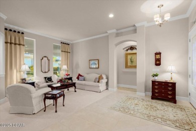 Step into elegance with this meticulously maintained residence on Plantation Bay Golf and Country Club in Florida - for sale on GolfHomes.com, golf home, golf lot