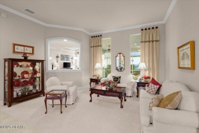 Step into elegance with this meticulously maintained residence on Plantation Bay Golf and Country Club in Florida - for sale on GolfHomes.com, golf home, golf lot