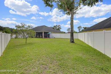 **GATED GOLF COMMUNITY**HUGE LOT**UPDATED** Discover elegance on Cimarrone Golf and Country Club in Florida - for sale on GolfHomes.com, golf home, golf lot