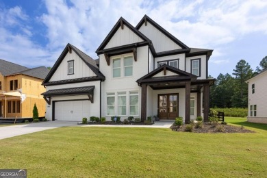 Welcome home to this executive home built by the Toll Brothers on Capital City Club Crabapple in Georgia - for sale on GolfHomes.com, golf home, golf lot