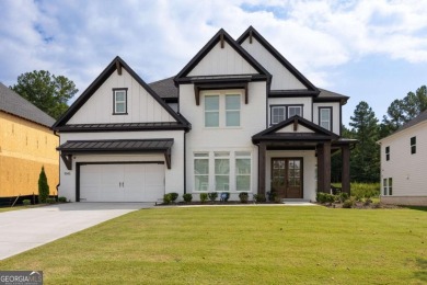 Welcome home to this executive home built by the Toll Brothers on Capital City Club Crabapple in Georgia - for sale on GolfHomes.com, golf home, golf lot