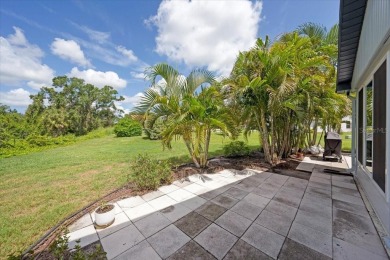 Picture this: You pull into the peaceful, gated community of on Kings Point Executive Golf Course in Florida - for sale on GolfHomes.com, golf home, golf lot