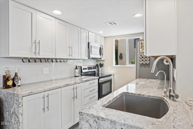 Very close to Old Town Scottsdale, this remodeled end-unit on Scottsdale Shadows in Arizona - for sale on GolfHomes.com, golf home, golf lot