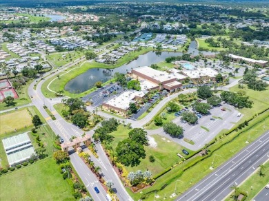Picture this: You pull into the peaceful, gated community of on Kings Point Executive Golf Course in Florida - for sale on GolfHomes.com, golf home, golf lot