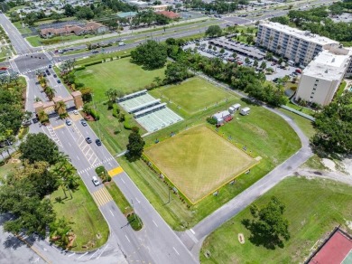 Picture this: You pull into the peaceful, gated community of on Kings Point Executive Golf Course in Florida - for sale on GolfHomes.com, golf home, golf lot