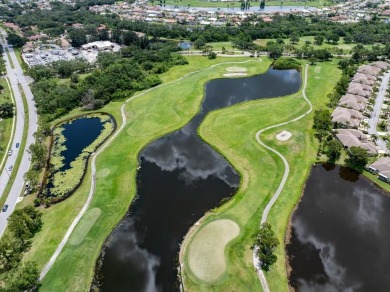 Picture this: You pull into the peaceful, gated community of on Kings Point Executive Golf Course in Florida - for sale on GolfHomes.com, golf home, golf lot