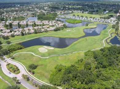 Picture this: You pull into the peaceful, gated community of on Kings Point Executive Golf Course in Florida - for sale on GolfHomes.com, golf home, golf lot