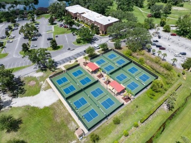 Picture this: You pull into the peaceful, gated community of on Kings Point Executive Golf Course in Florida - for sale on GolfHomes.com, golf home, golf lot