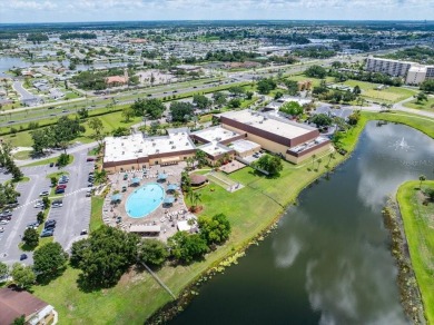 Picture this: You pull into the peaceful, gated community of on Kings Point Executive Golf Course in Florida - for sale on GolfHomes.com, golf home, golf lot