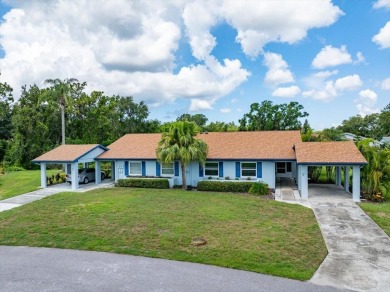 Picture this: You pull into the peaceful, gated community of on Kings Point Executive Golf Course in Florida - for sale on GolfHomes.com, golf home, golf lot