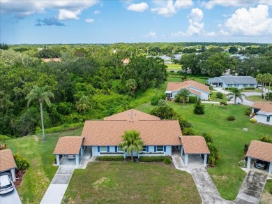 Picture this: You pull into the peaceful, gated community of on Kings Point Executive Golf Course in Florida - for sale on GolfHomes.com, golf home, golf lot