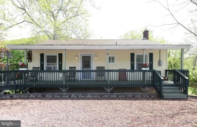 Welcome to your dream riverside escape'a charming and furnished on Riverview Country Club in Pennsylvania - for sale on GolfHomes.com, golf home, golf lot