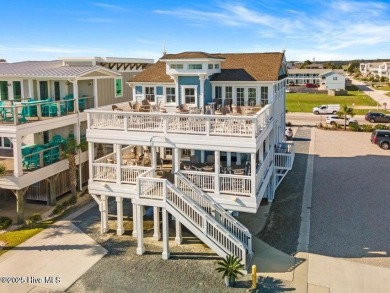 Discover the Skiff, a beautiful new Logan Home, located in on Sea Trail Golf Resort in North Carolina - for sale on GolfHomes.com, golf home, golf lot