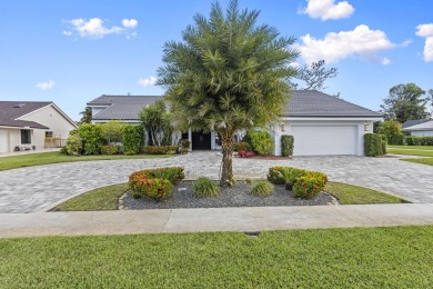 Large open and bright home overlooking the golf course, huge on Boca Woods Country Club in Florida - for sale on GolfHomes.com, golf home, golf lot